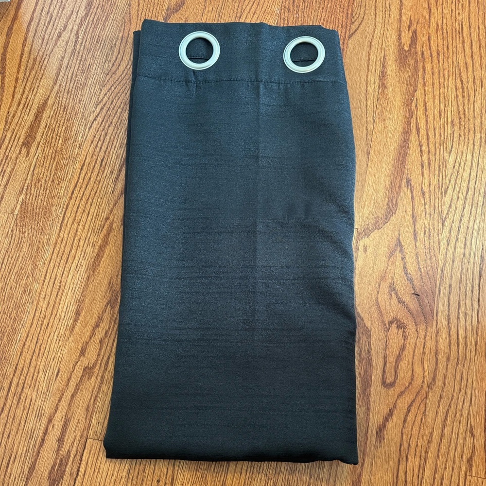 Black grommet top curtains two panels. 37”W by 96” L